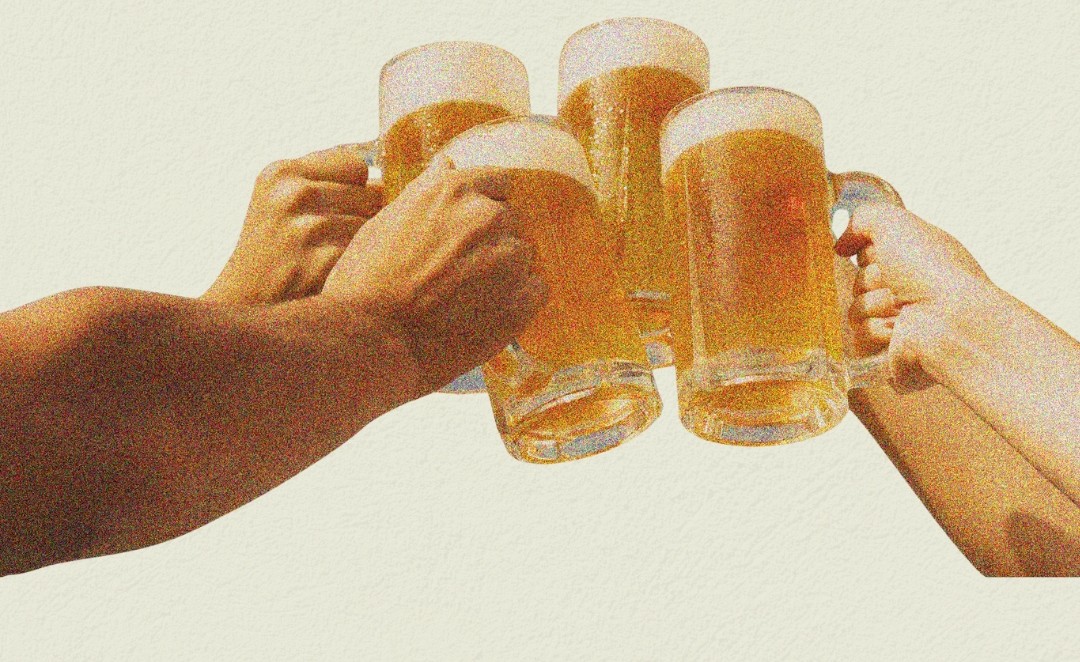Hands cheersing with beer mugs